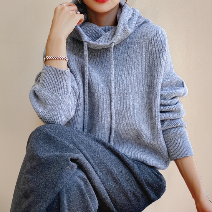 Lena women's Merino wool high-neck sweater, a warm and elegant long-sleeve top for winter fashion.