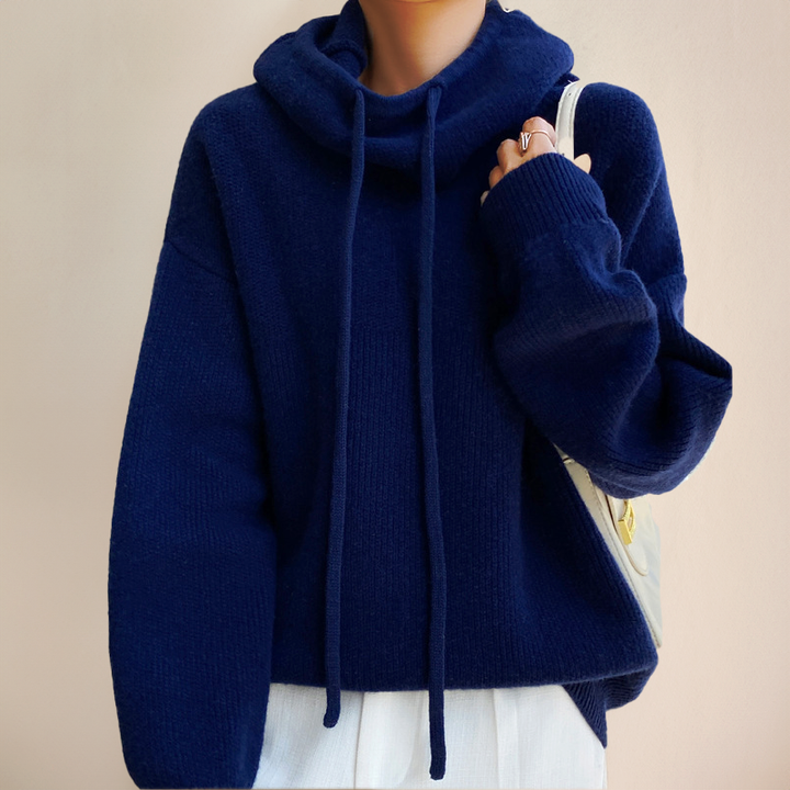 Lena Merino wool high-neck sweater, providing elegant style and warm comfort for women's winter fashion.