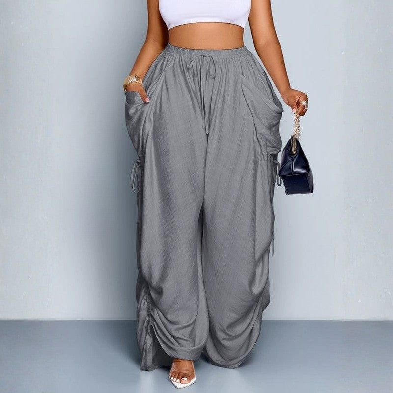 Stylish women's high-waist wide leg pants with drawstring, offering a relaxed & comfortable fit.