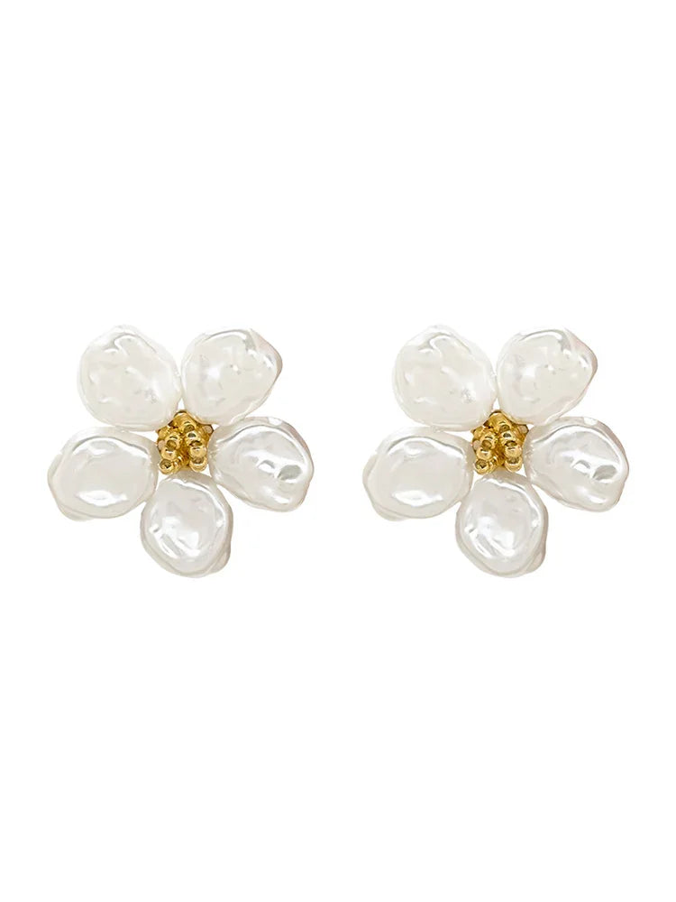 Unique irregular pearl petal earrings for women, featuring a distinctive and artistic design. Fashion jewelry.