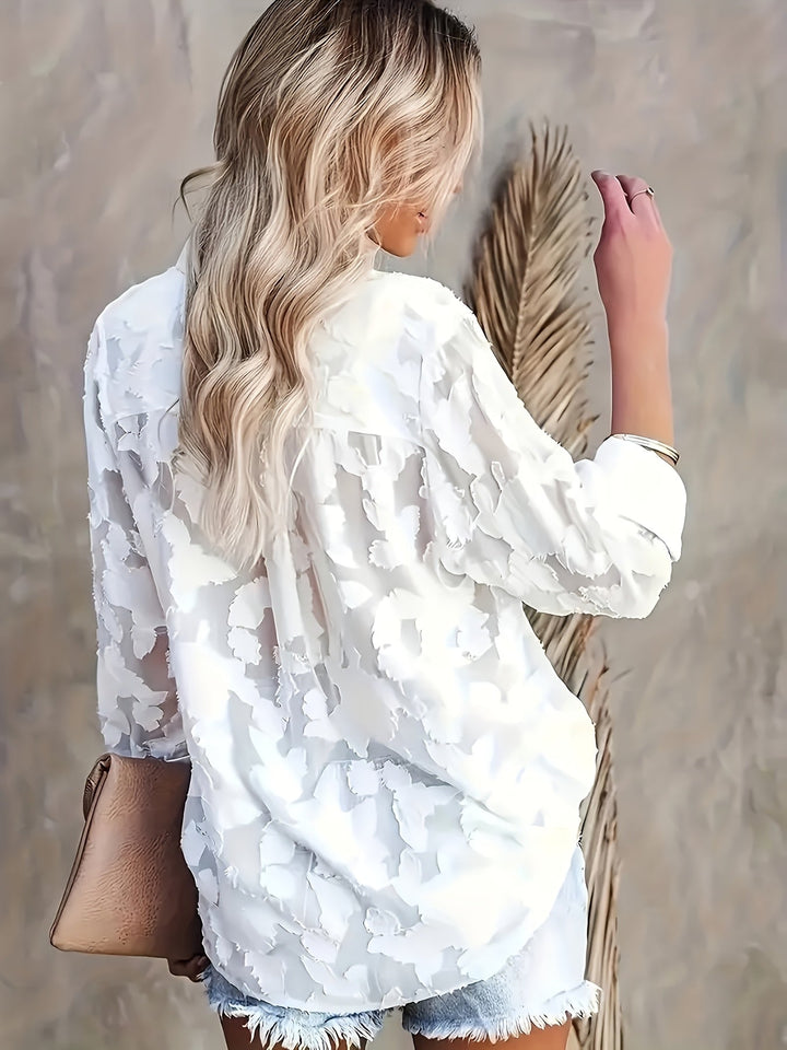 Comfortable loose-fit long sleeve women's jacquard V-neck blouse, a chic and elegant fashion top.