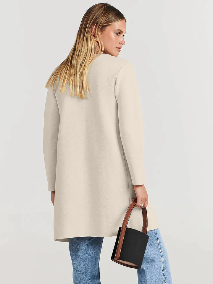 Women's knit cardigan, a cozy and chic choice for versatile autumn & winter fashion.