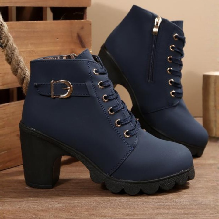 Fashionable women's lace-up chunky heeled ankle boots, ideal for stylish fall outfits and winter comfort.