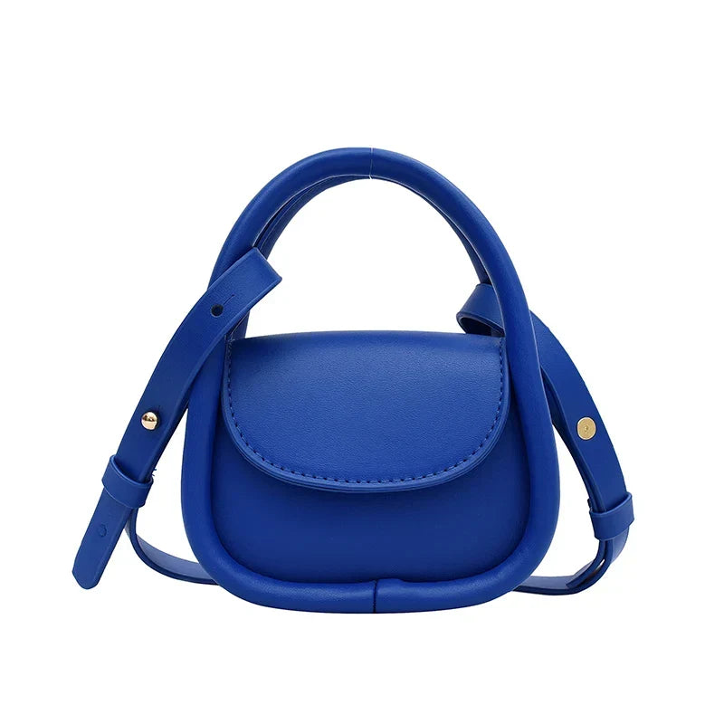 Stylish women's leather shoulder bag with an adjustable strap and chic design.