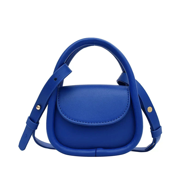 Stylish women's leather shoulder bag with an adjustable strap and chic design.