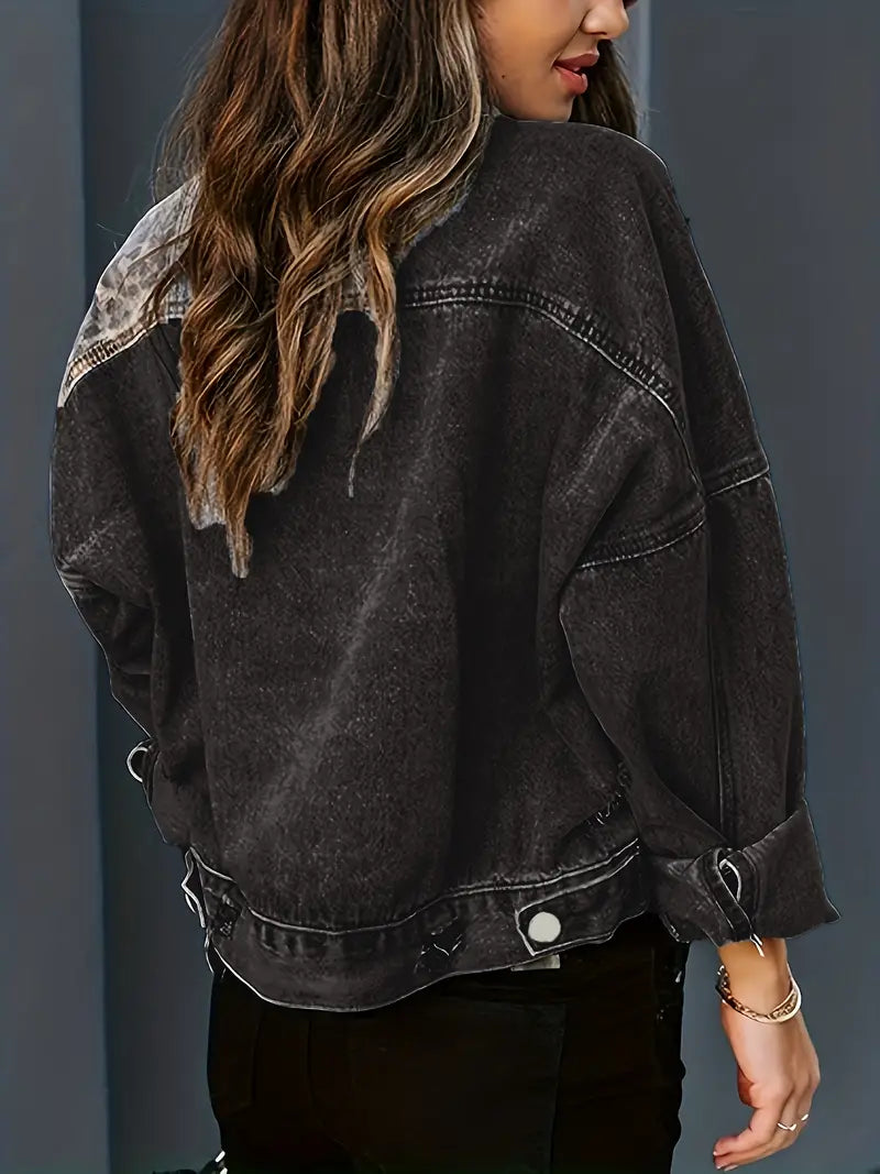 Fashionable women's leopard print denim jacket, offering a bold street style look.