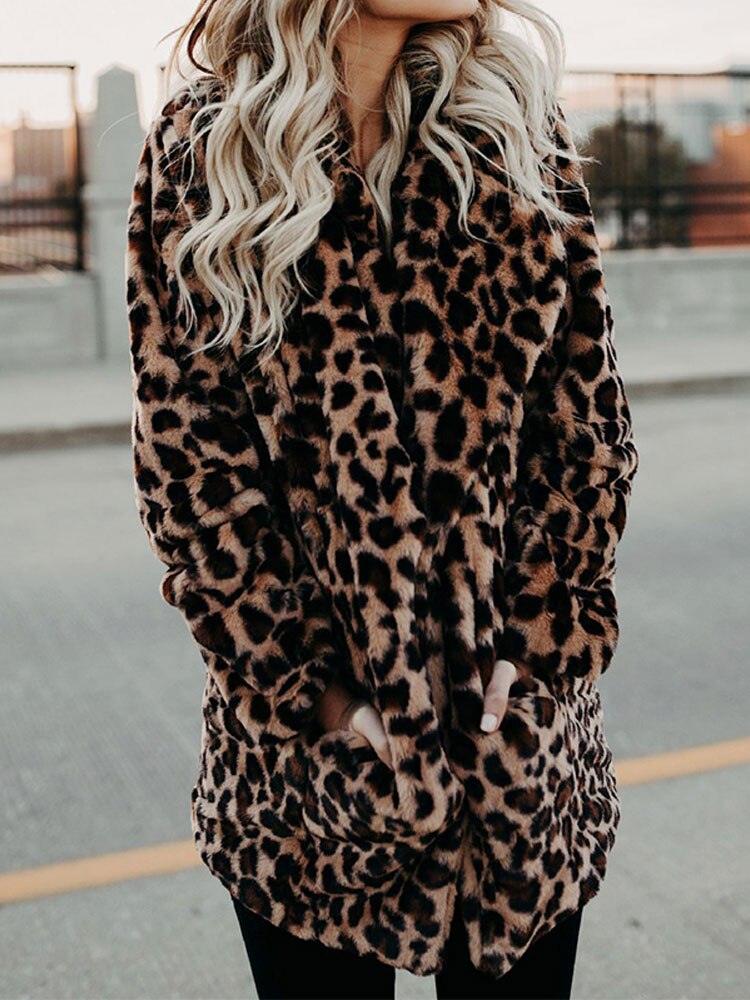 Stylish women's leopard print coat, a chic statement piece for winter fashion outerwear.