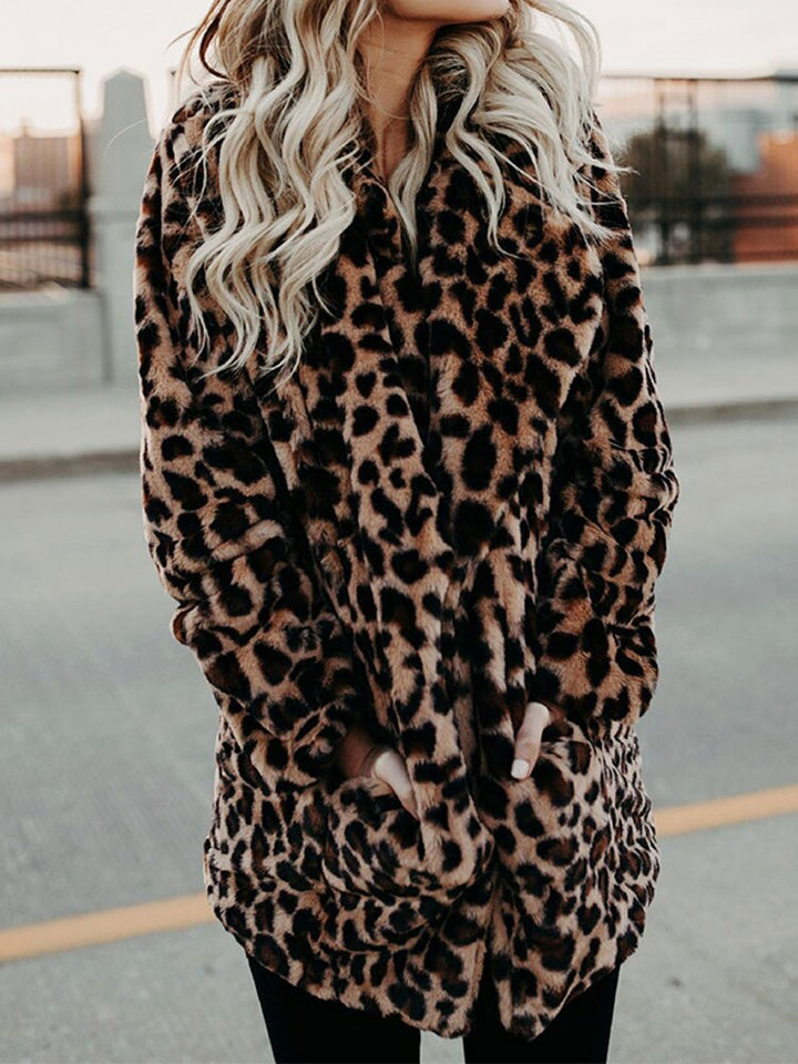 Stylish women's leopard print coat, a chic statement piece for winter fashion outerwear.