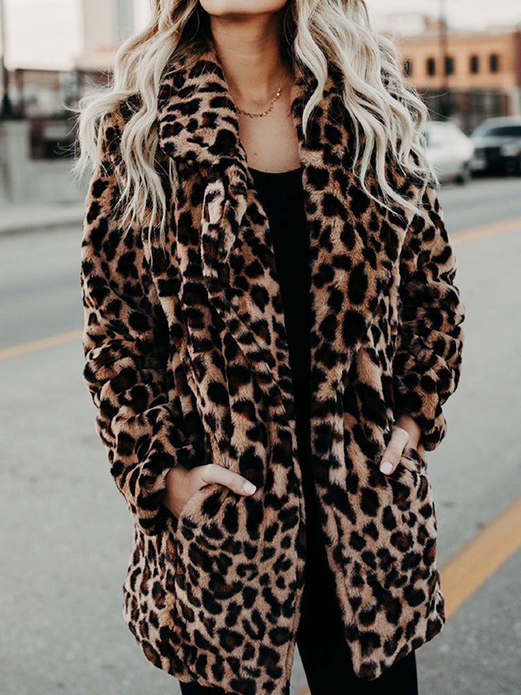 Fashionable women's leopard print winter jacket, perfect for a chic and warm cold-weather look.