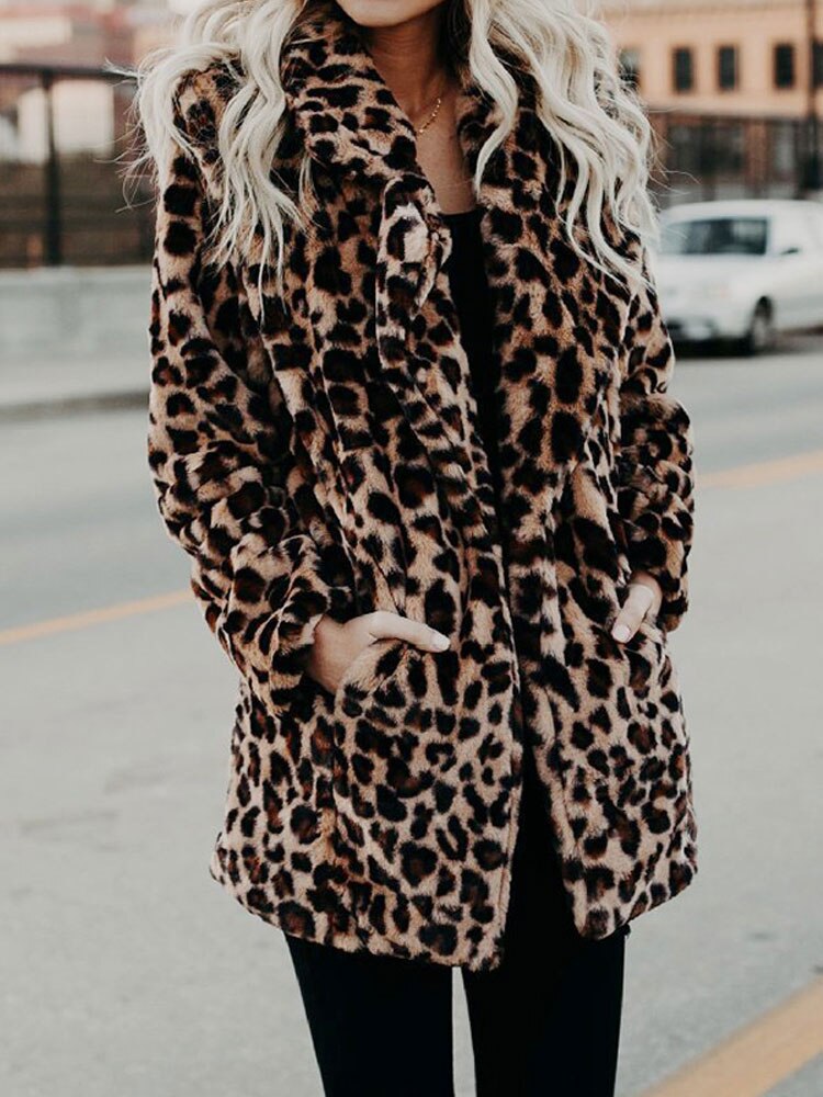 Trendy women's leopard print winter coat, providing warmth and chic style for any occasion.