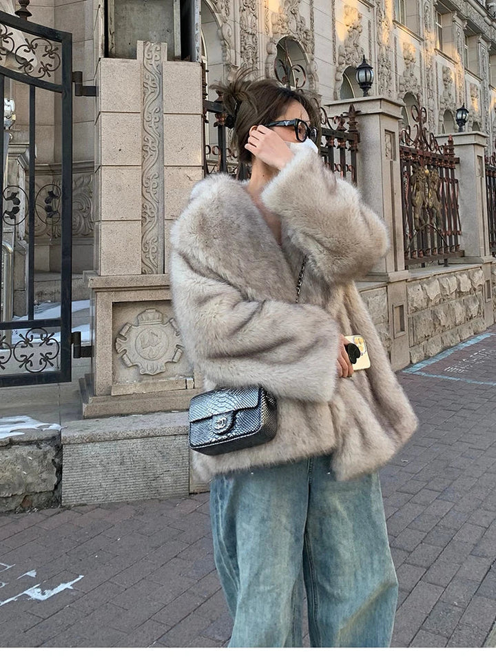 Elegant women's sophisticated coat in a versatile neutral color. Timeless luxury outerwear for chic winter style.