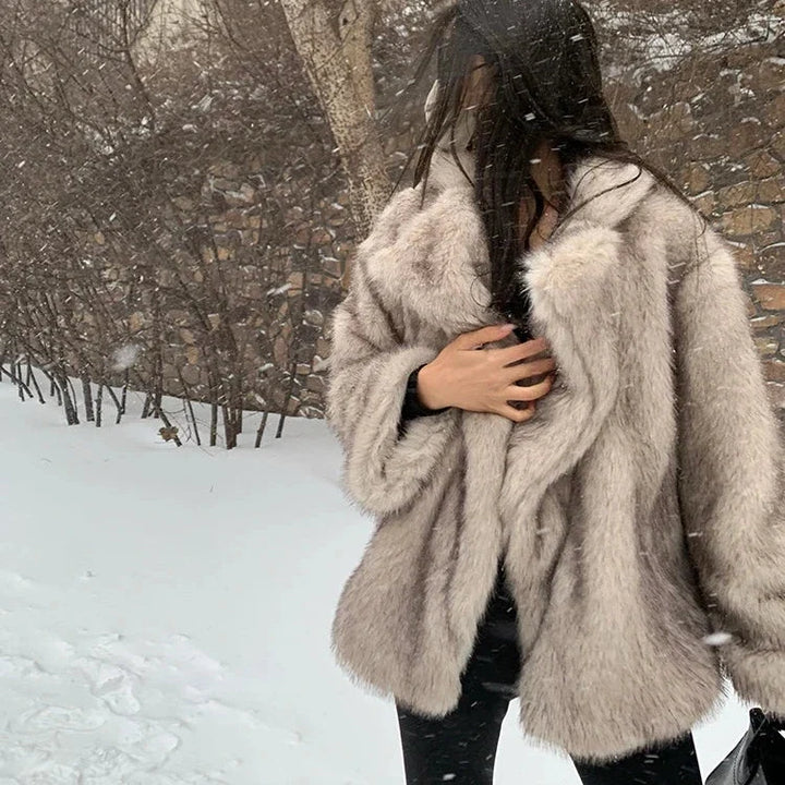 Luxurious women's soft coat, chic and timeless outerwear. This elegant winter jacket offers cozy comfort and sophisticated style.