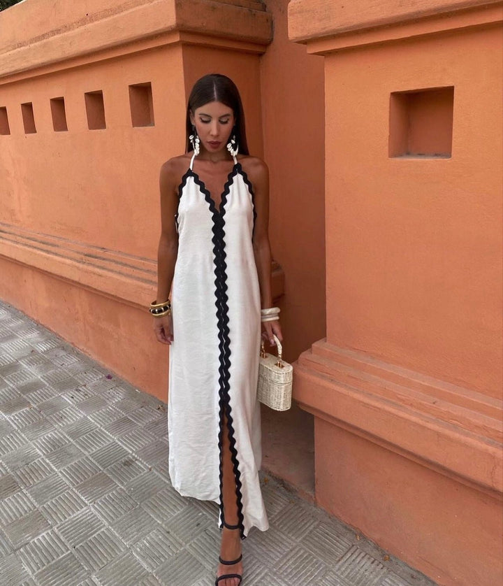 Sleeveless V-neck maxi dress for women, featuring stylish contrast trim. Ideal for resort wear, parties, or guests.