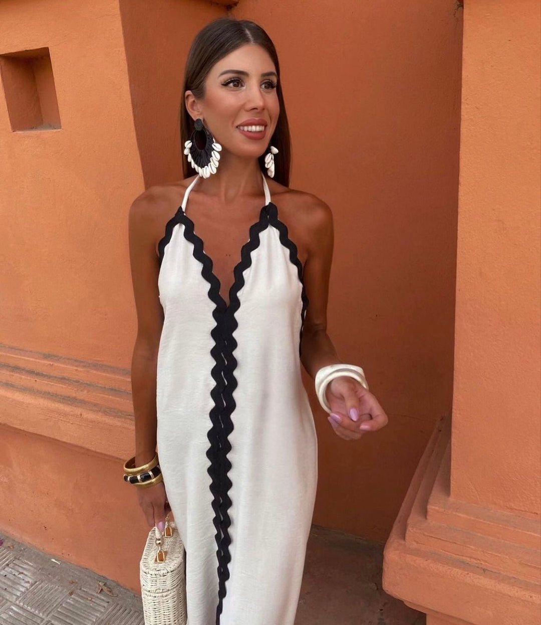 Elegant women's summer maxi dress with chic contrast trim and a flattering V-neck, perfect for wedding guests.