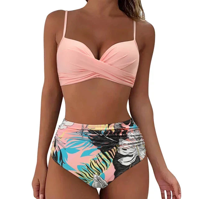 Dynamic pose of a woman in the chic Mila bikini set, showcasing summer swim fashion.