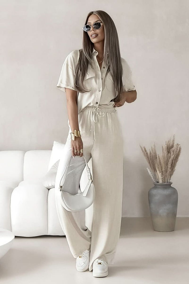 Comfortable women's two-piece lounge set. Minimalist design, chic & versatile for everyday coordinated style.