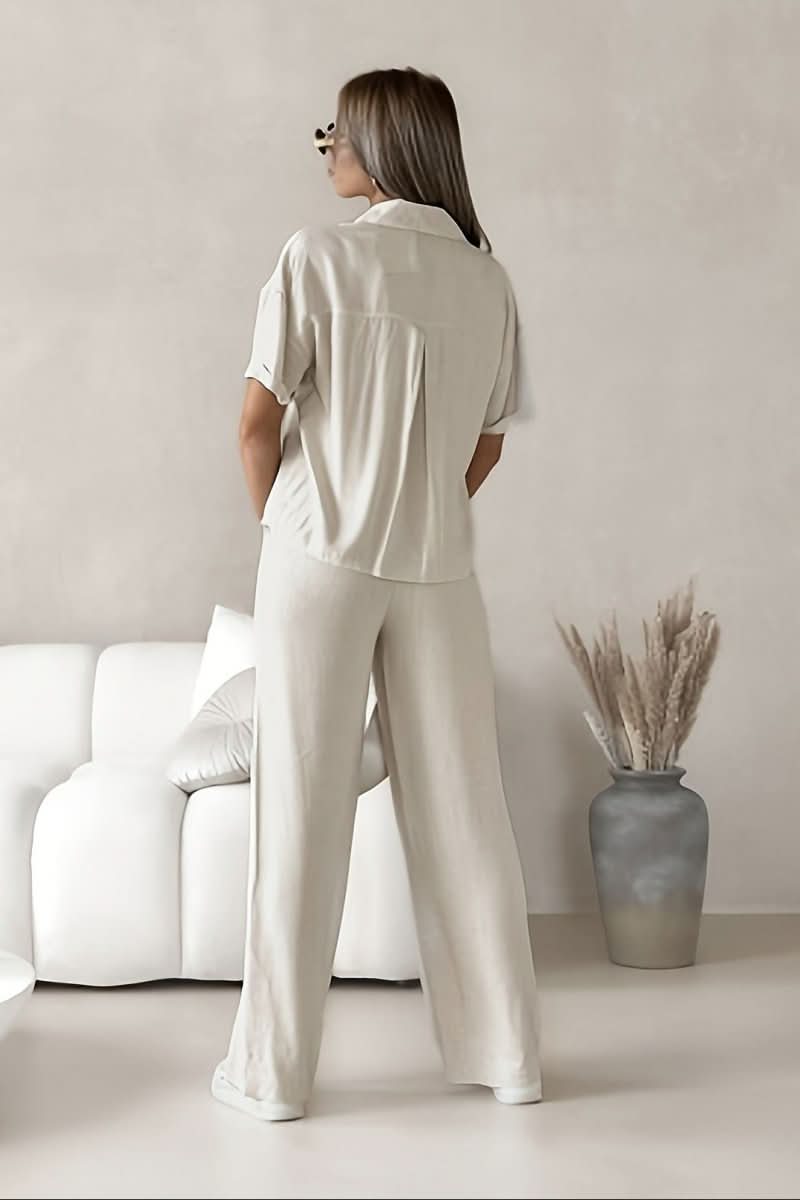 Women's minimalist two-piece set, featuring a stylish top & coordinated bottom. Chic & versatile loungewear.
