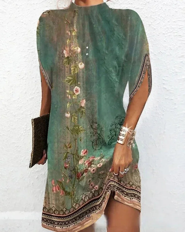 Stylish women's short dress with a mock neck, unique cape sleeves, and an asymmetric hem.
