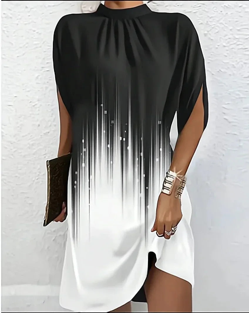 Versatile women's elegant mini dress. Features a mock neck, chic cape sleeves & a contemporary short design.