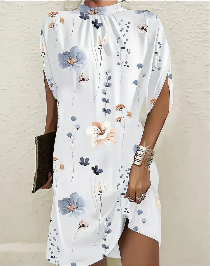 Versatile women's mini dress: mock neck, stylish cape sleeves & modern asymmetric hem.