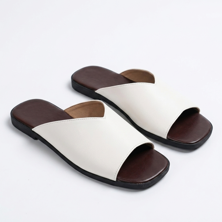 Comfortable white open-toe flats for women, lightweight summer shoes for chic everyday style.