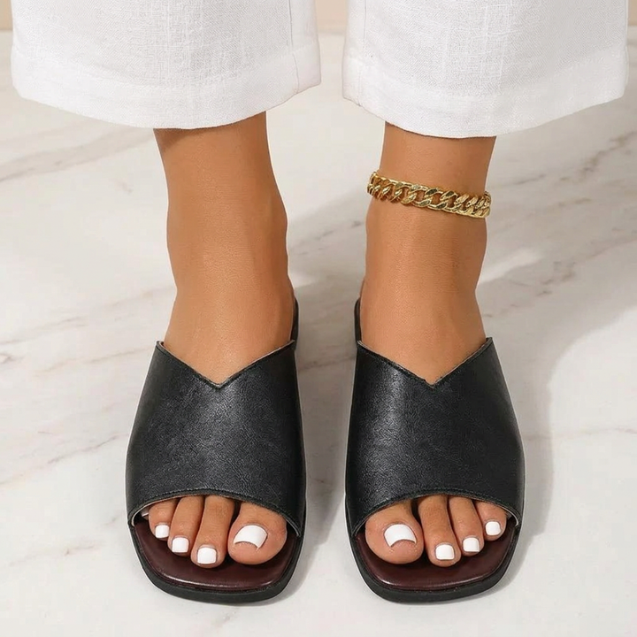Beige open-toe flats for women, comfortable, lightweight, ideal for casual summer footwear.