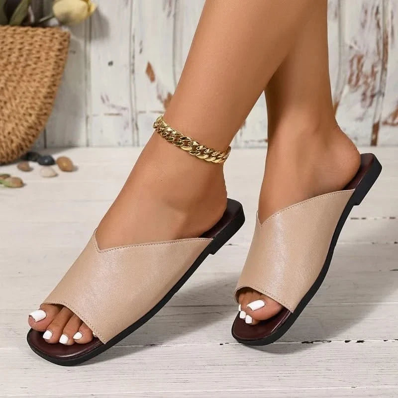 Chic open-toe flats for women, stylish & comfortable, ideal casual footwear for summer days.