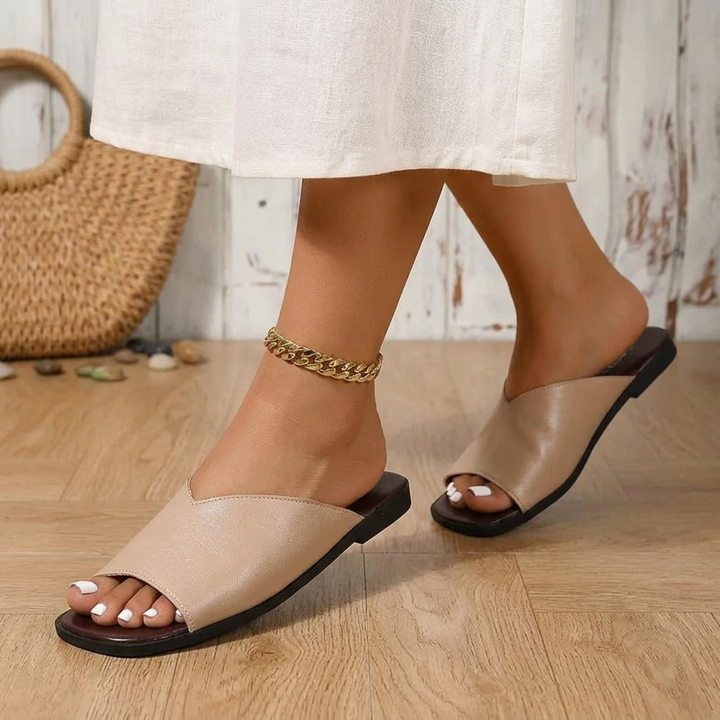 Women's open-toe flats, lightweight & comfortable, stylish footwear for everyday summer fashion.