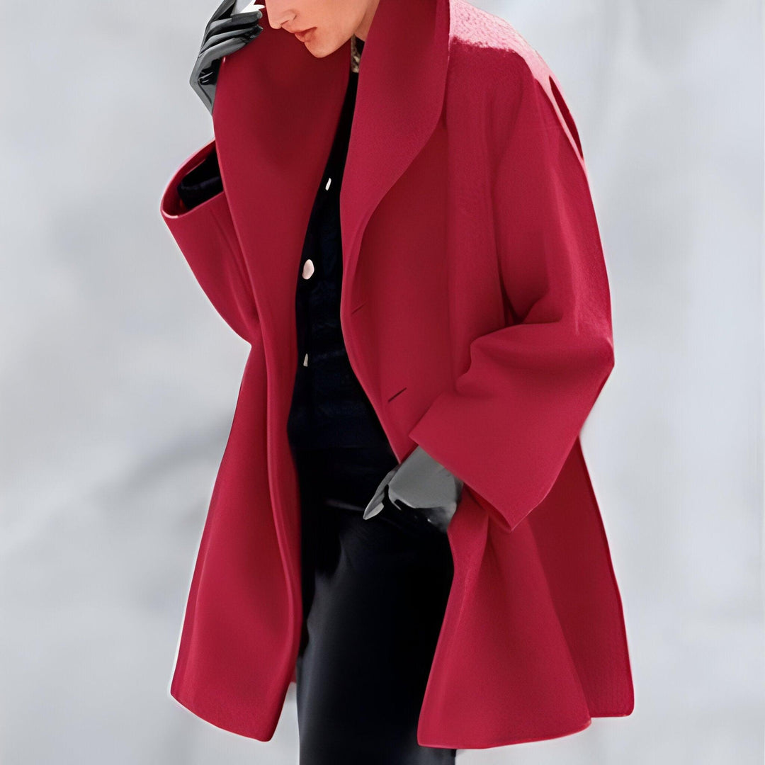 Chic women's oversized coat, perfect for versatile layering. A timeless long outerwear piece for elegant fall and winter style.