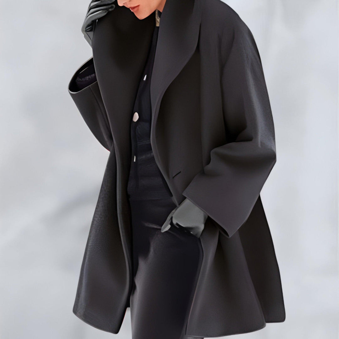 Women's timeless oversized winter coat. Elegant long outerwear for fall and winter warmth, offering a chic, relaxed fit.