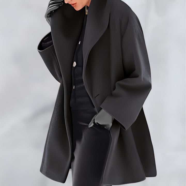 Women's timeless oversized winter coat. Elegant long outerwear for fall and winter warmth, offering a chic, relaxed fit.