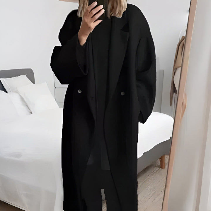 Modern women's oversized lapel collar coat for chic winter outerwear. Comfortable and warm, a versatile fashion piece.