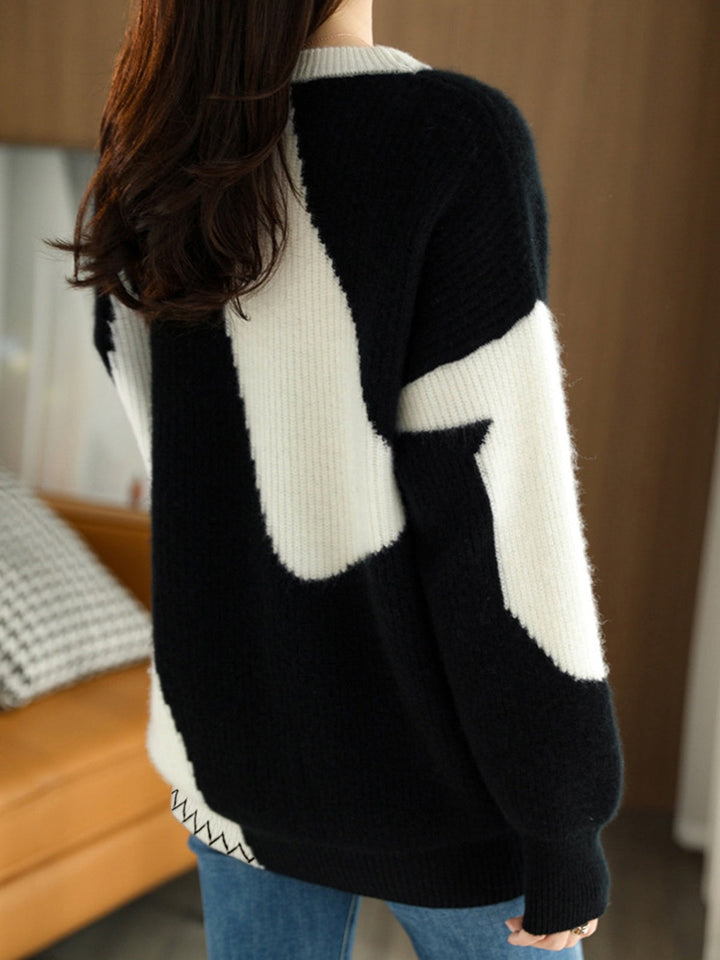 Relaxed fit women's oversized zebra print sweater, offering ultimate comfort and a chic fashion statement.