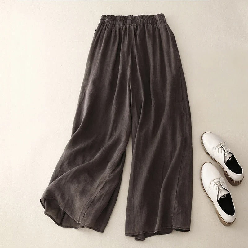 Stylish wide leg women's pants offering a relaxed fit and chic everyday comfort. Versatile for casual elegant wear.