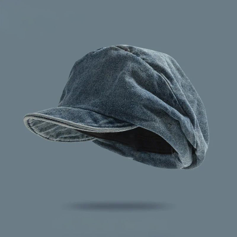 Chic women's retro blue beret hat. Stylish fashion accessory, perfect for casual wear.