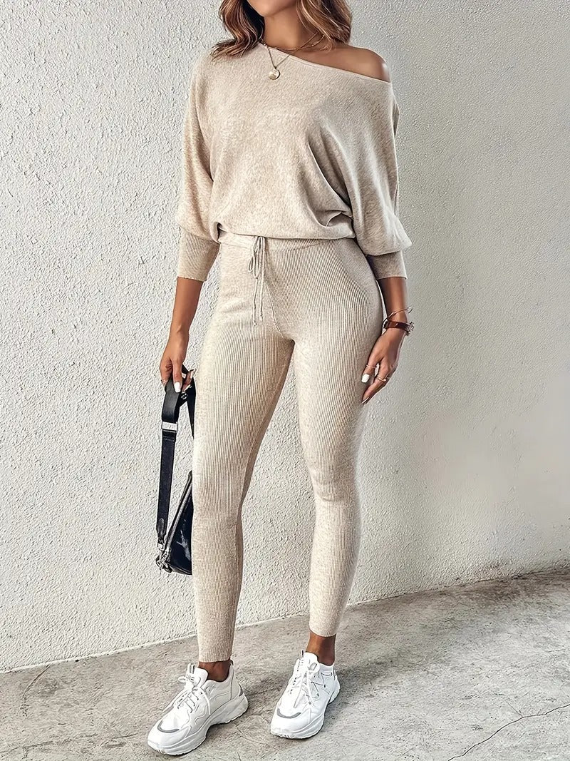 Chic women's ribbed two-piece lounge set, perfect for cozy fall & winter loungewear. Casual high-waisted pants & top.