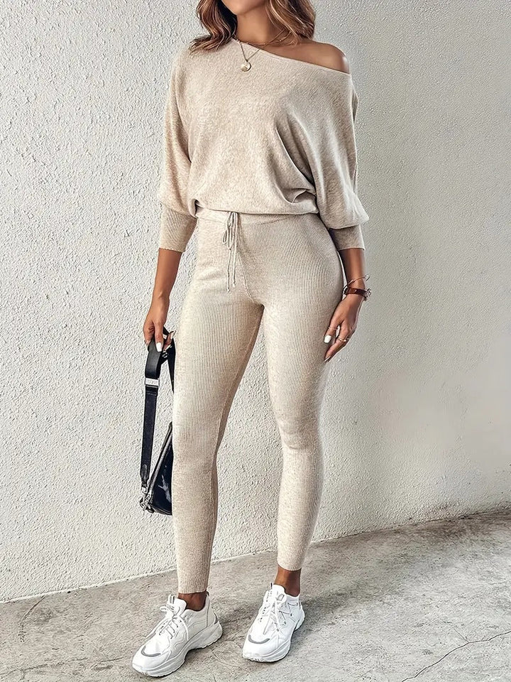 Chic women's ribbed two-piece lounge set, perfect for cozy fall & winter loungewear. Casual high-waisted pants & top.