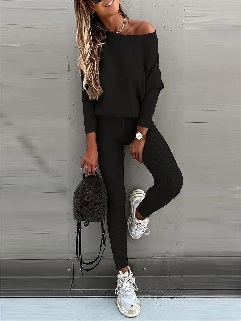 Women's cozy ribbed two-piece loungewear set in a neutral shade, great for relaxing at home or casual outings.