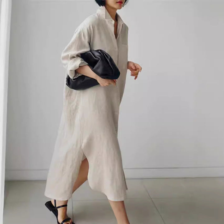 Relaxed fit women's casual midi shirt dress featuring roll sleeves & functional pockets. Chic and versatile for summer.