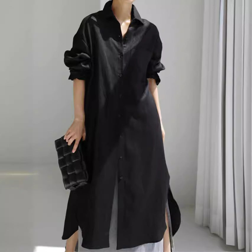 Stylish women's button-down midi shirt dress. Features practical roll-up sleeves and convenient side pockets. Classic chic.