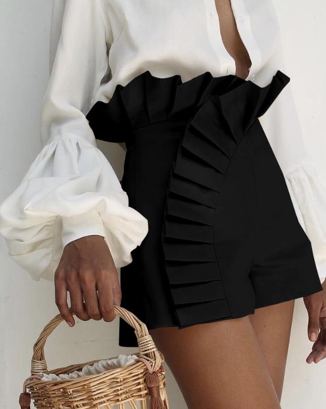 Elegant women's ruffle shorts, ideal for summer beachwear or stylish casual outfits.