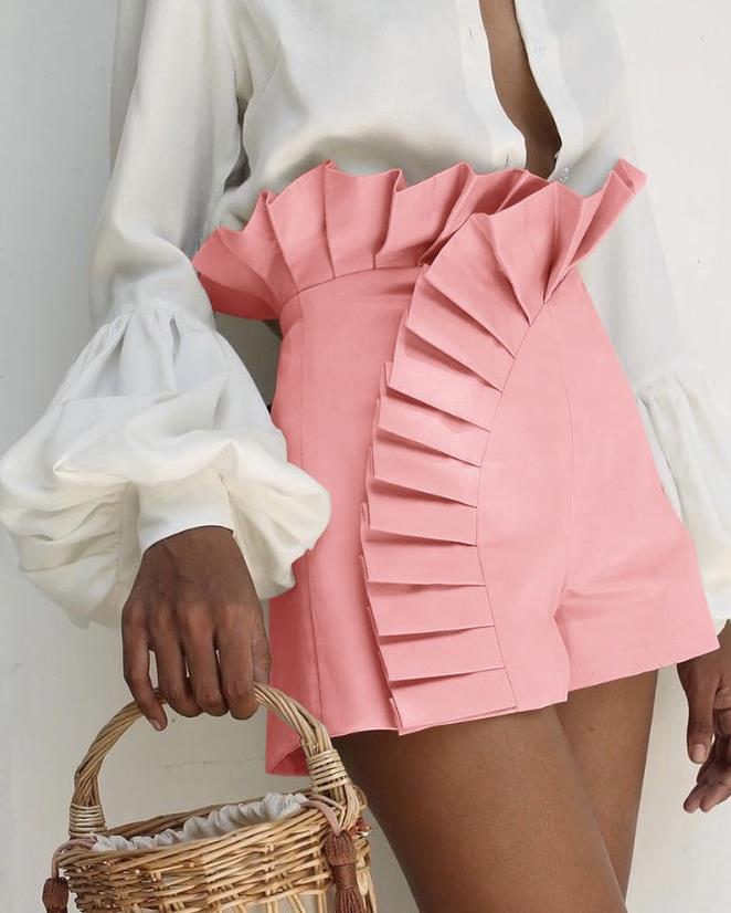 Stylish women's flared ruffle shorts, offering comfort and a chic look for warm weather.