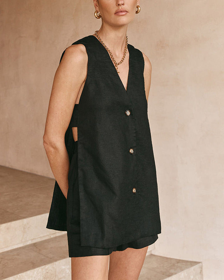 Elegant women's high-waisted shorts. Part of a chic two-piece sleeveless gilet & shorts set for summer fashion.