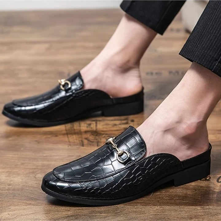 Elegant women's slip-on mules for sophisticated style; comfortable and chic summer footwear.