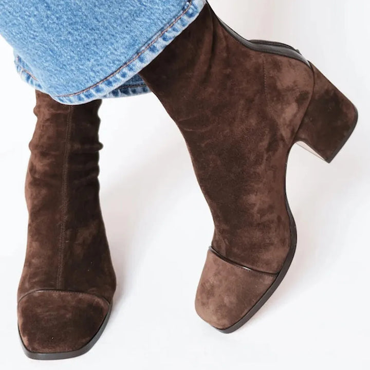 Chic women's square toe heeled ankle boots with block heel. Perfect stylish footwear for fall & winter.