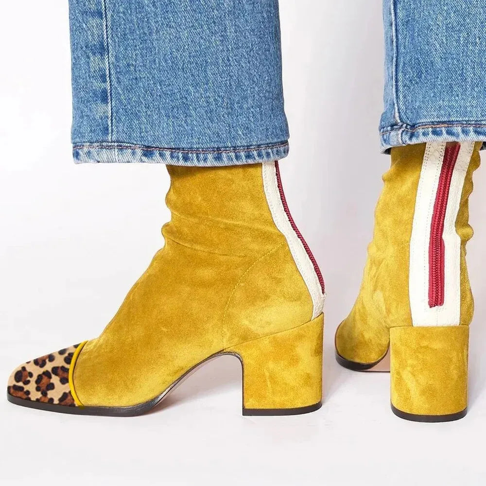 Versatile women's heeled boots. Square toe, block heel design. Fashion ankle boots for winter comfort.