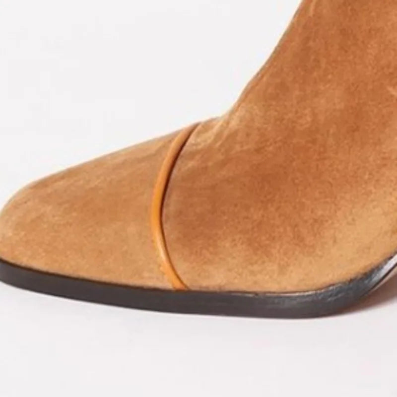 Women's fashionable square toe heeled boots. Elegant ankle boots with a comfortable block heel.