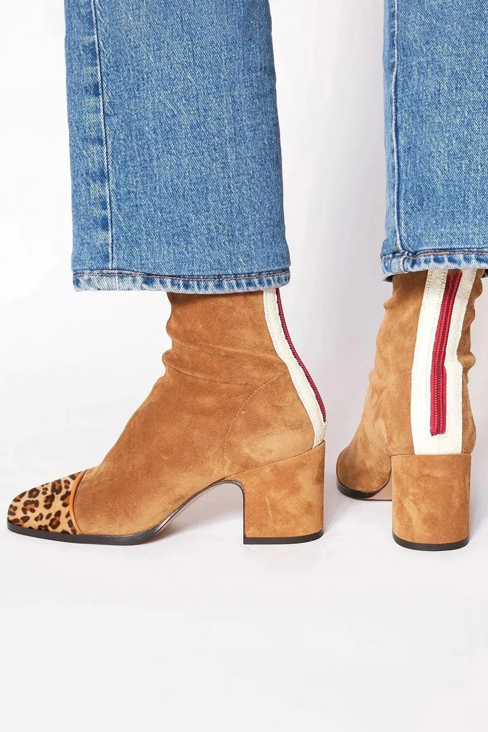 Modern comfort women's square toe ankle boots. Chic heeled boots with a block heel for versatile style.