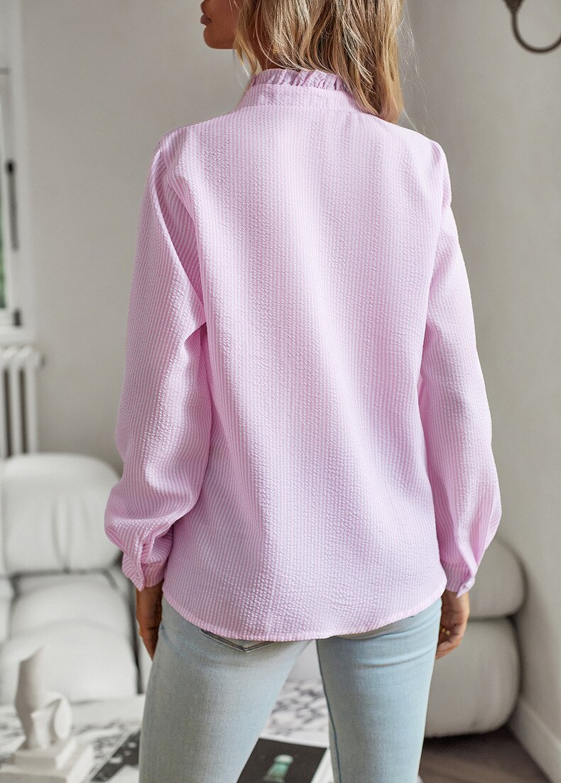 Versatile striped women's blouse. Long sleeve and comfortable for office or casual looks.