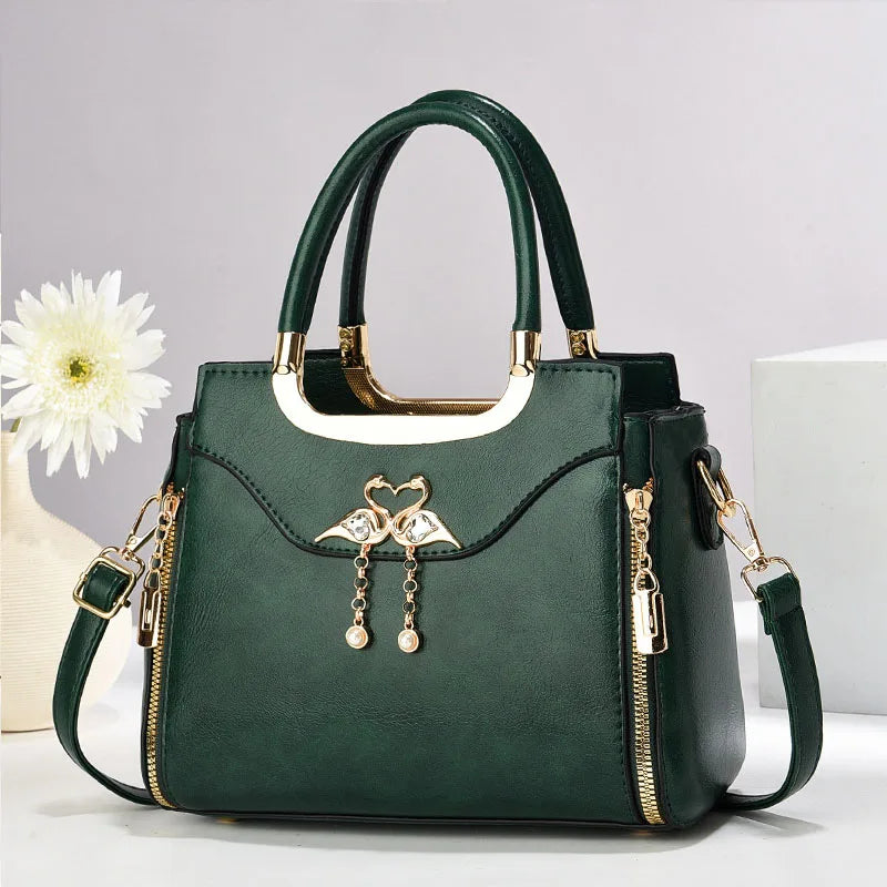 Women's chic structured handbag. This elegant faux leather shoulder bag includes a convenient detachable strap.